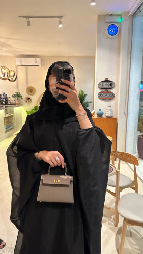 عبايه بشت بقماش اورقنز