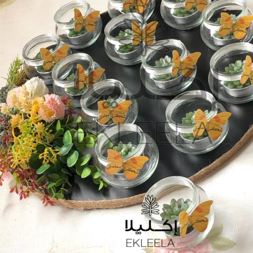 توزيعات شموع يوم المعلم  مع قاعده خشب (  12 شمعه )