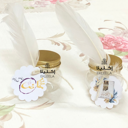 علب توزيعات بلاستيكيه حجم صغير مع ثيم اليوم العالمي للغه العربيه  ( 12 علبه )