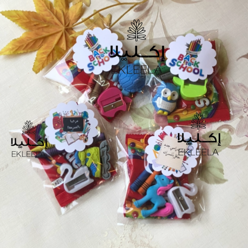 توزيعات مع ثيم ورقي عن العوده للمدرسه ( 12 قطعه )