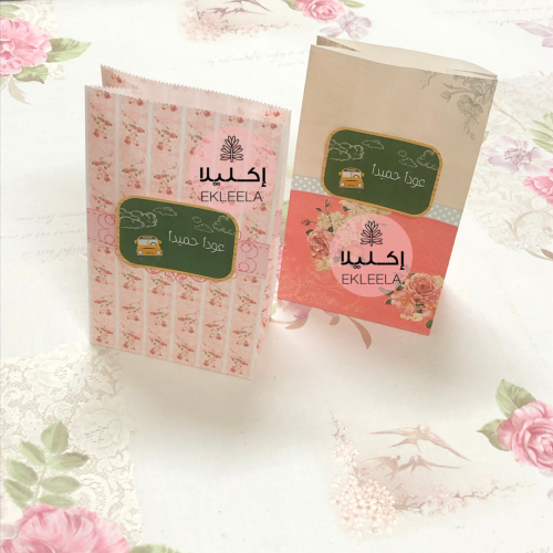 اكياس ورقيه بثيم العوده للمدرسه  / كيس ورقي  للفشار والبسكويت والاطعمه ( 12 حبه)