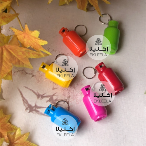 ميداليات على شكل انبوب غاز / توزيعات الدفاع المدني ( 12 قطعه )