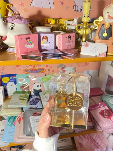 توزيعات عطر مع عباره عيد