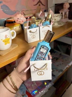 توزيعات عطر قوتشي الازرق ميني