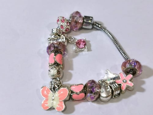 سوار نسائي مطلي بالفضة بتصميم انيق مع كريستال لامع من سواروفسكي اليمينتس