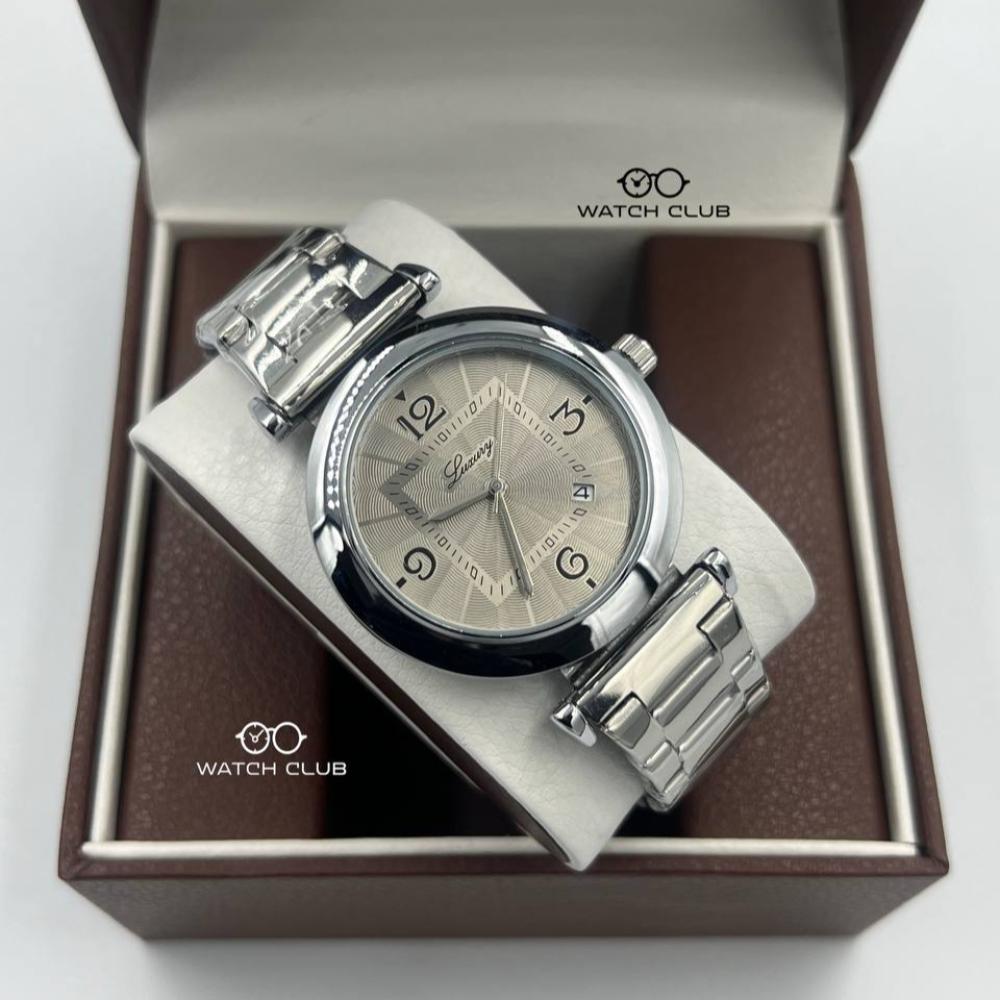 ساعة بأطار دائري فضي مينا رمادي