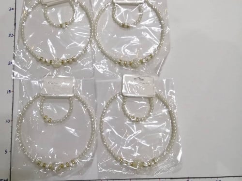 سلسال وأسورة لول أبيض