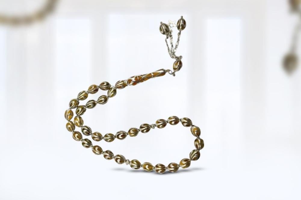 رحلة في عالم الخرز  من حبة بسيطة إلى مسبحة فنية