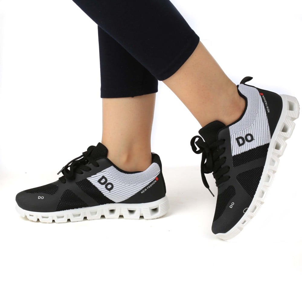 Sports shoes black and white online