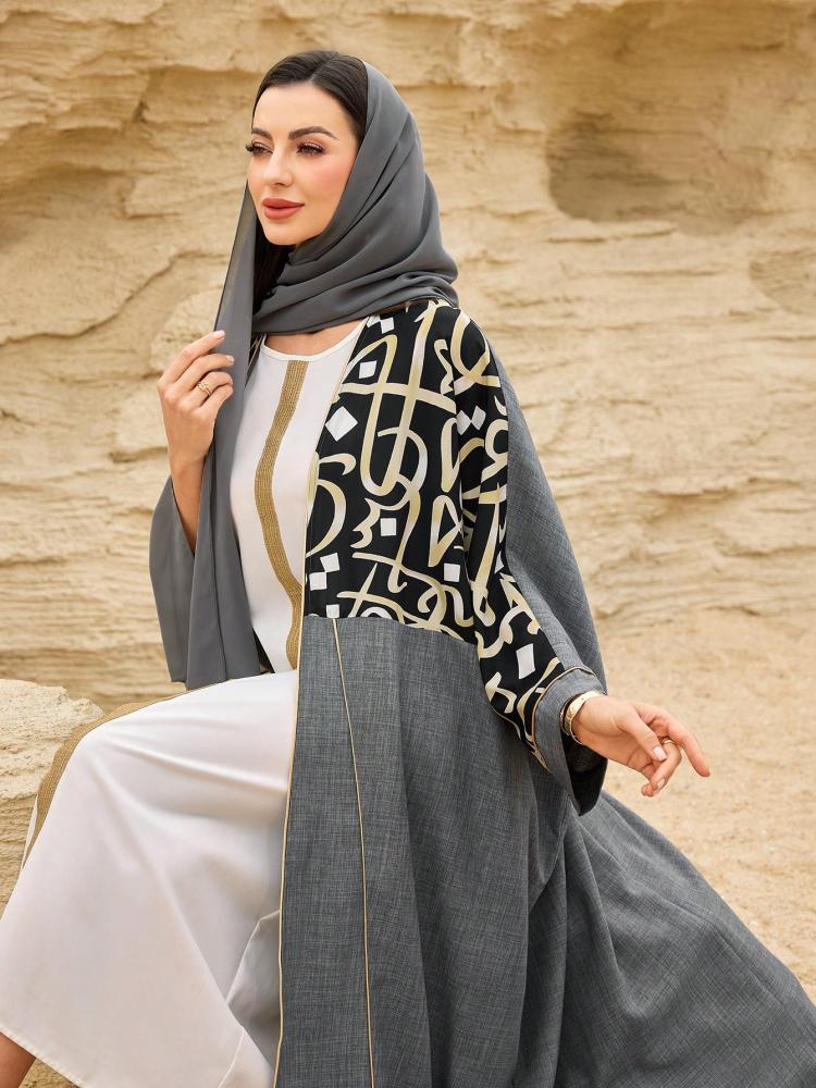 Abaya with a loose design and Arabic print