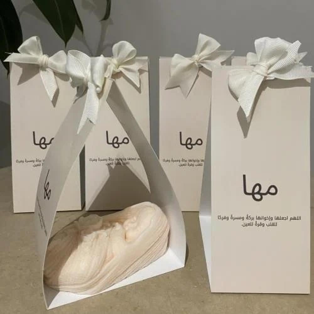 توزيعات مواليد وتقديمات الزواج من الشموع: لمسة دافئة لمناسباتك المميزة