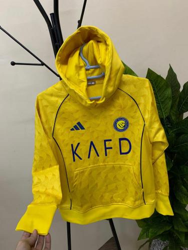 بلوفر شتوي نادي النصر الجديد 2026 لون اصفر