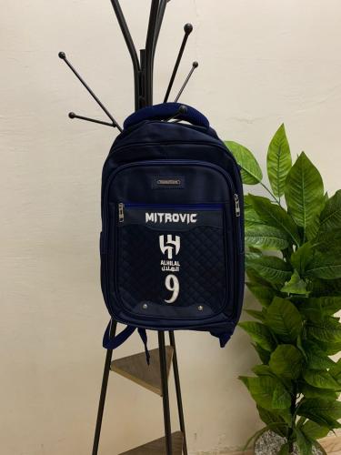 شنطة بشعار نادي الهلال لون كحلي مع طباعة الاسم والرقم