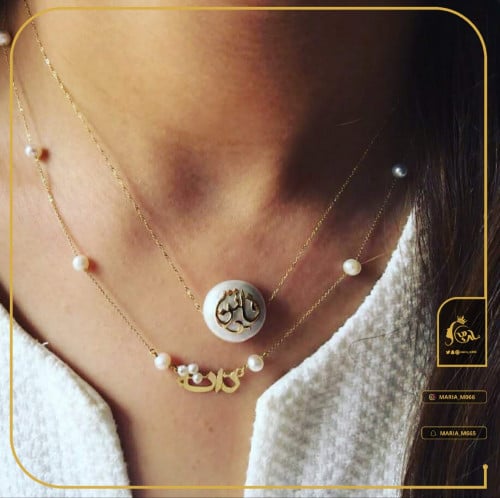 سلاسل صدفي بالاسم مع إضافة لؤلؤ ابيض