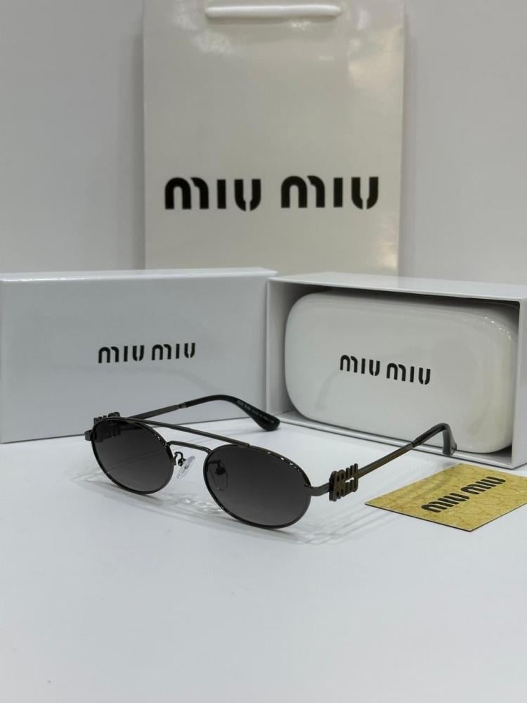 نظارات شمسية بيضاوية Miu Miu اطار معدني