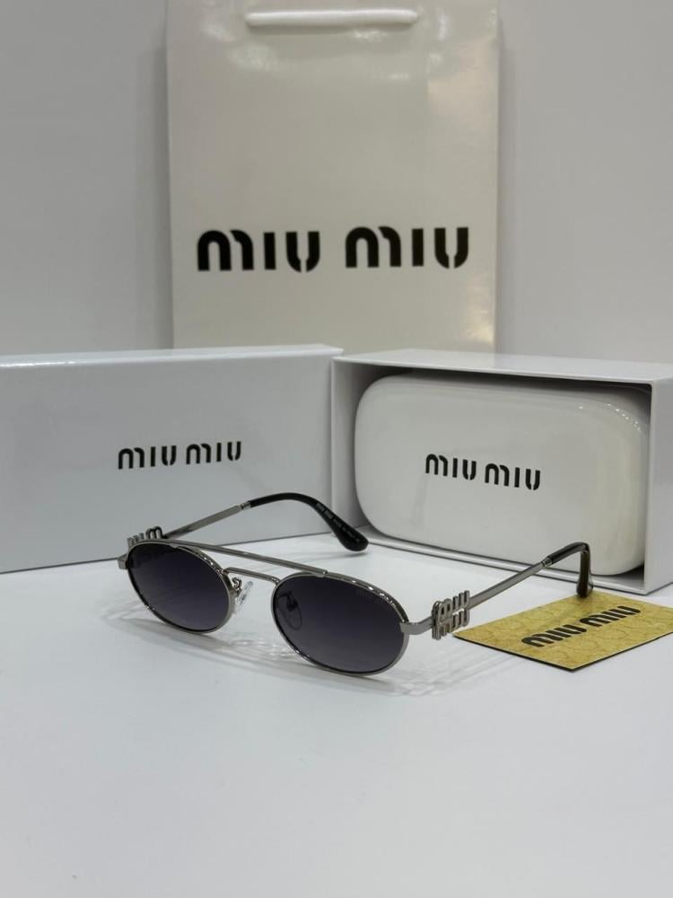 نظارات شمسية بيضاوية Miu Miu اطار معدني