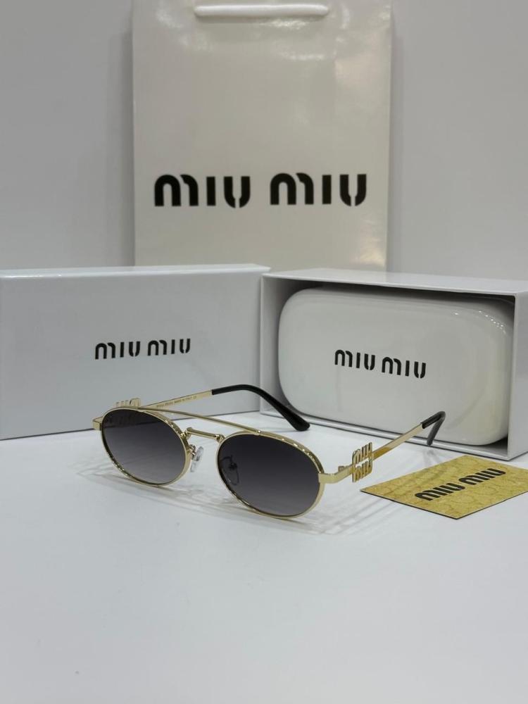 نظارات شمسية بيضاوية Miu Miu اطار معدني