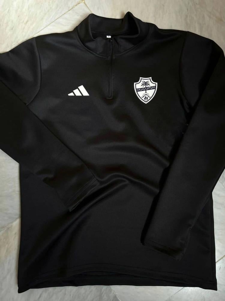 سويتر الاهلي لون اسود