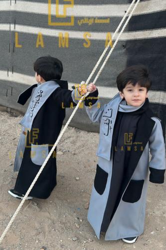 فروه اطفال ولادي لون رصاصي مع لون اسود دبل فيس مع...