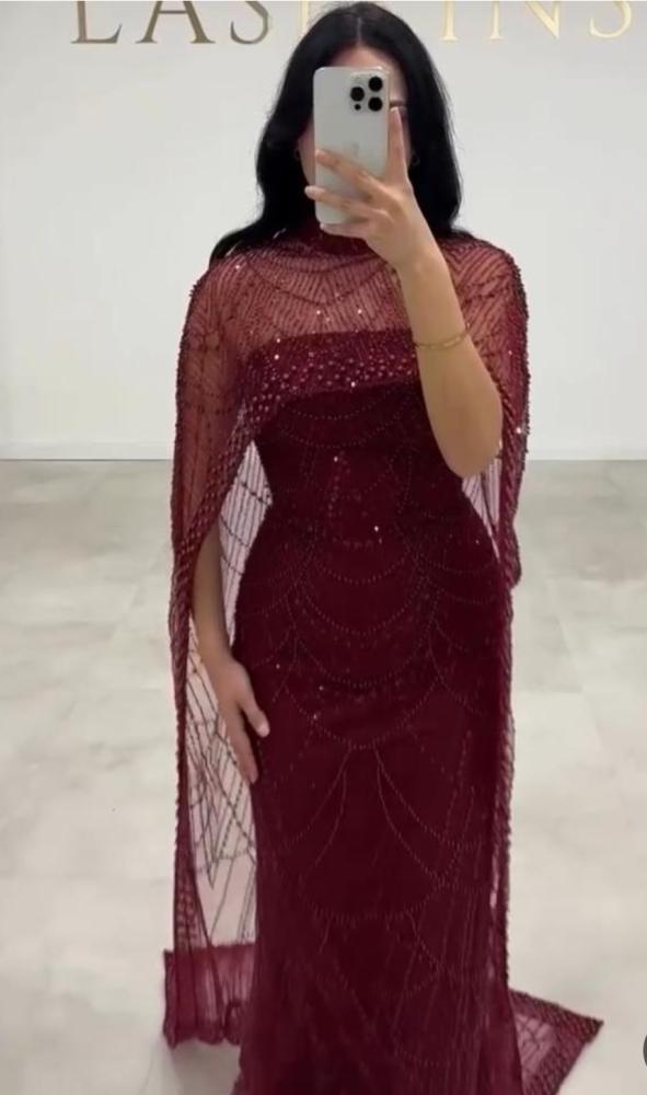 فستان أنيق  بأكمام مميزه