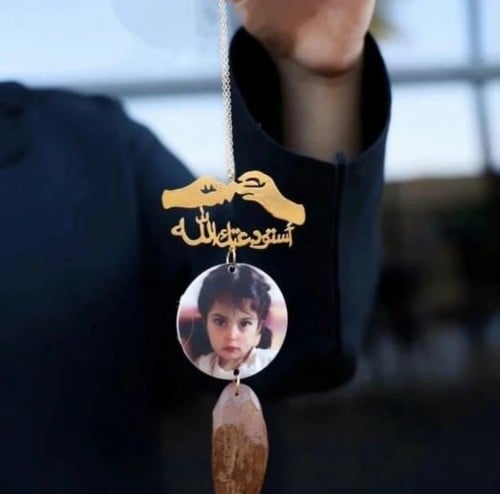تعليقة سيارة بصورة