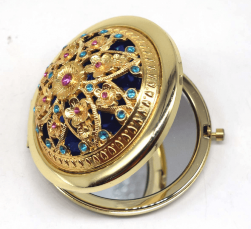 مرآة صغيرة للجيب مزخرفة