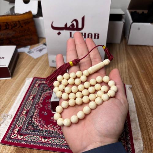 سبحة بكلايت لون العاج كركوشة عنابي