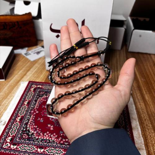 سبحة بكلايت شفاف خيط اسود كركوشة سوداء