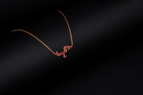 سلسال حُب ذهب عيار 18مزين  بالحجر الروبي