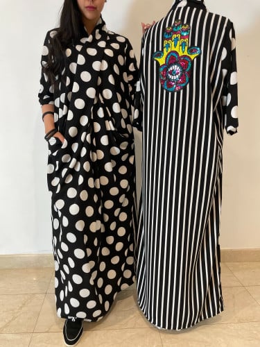 ثويب لف بالمزيج المحبوب أبيض وأسود مع اضافة مميزة