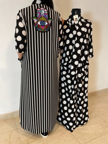 ثويب لف بالمزيج المحبوب أبيض وأسود مع اضافة مميزة