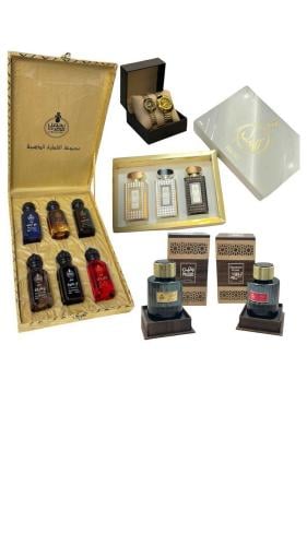 بكج يتكون من 11عطر وساعتين اسود مع ذهبي