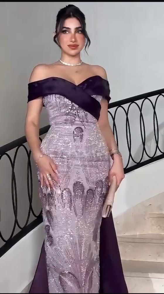 فستان سهرة كلفه مطرزة مع اورجنزا