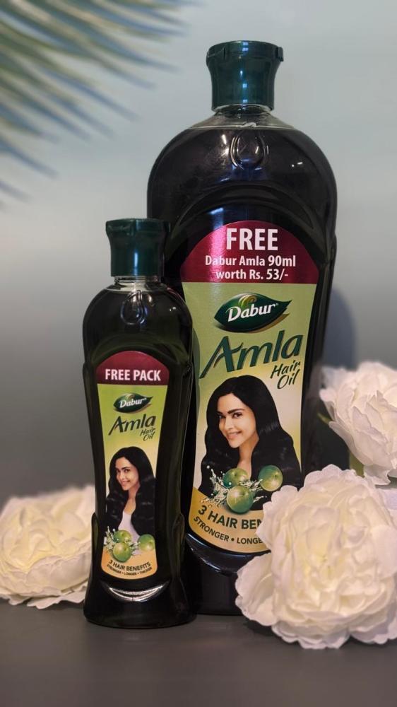 زيت دابر املا الهندي عبوتين ( عبوة أساسية و عبوة صغيره هديه مجاناً )