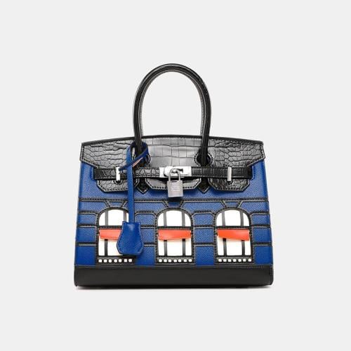 شنطة يد نسائية جلد بنقشة نوافذ