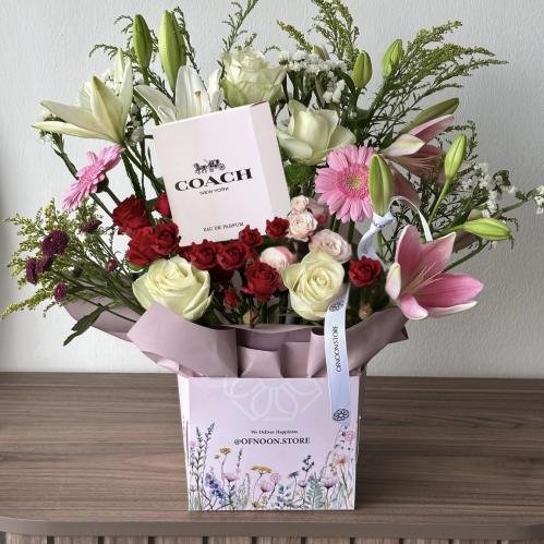 عطر كوتش نيويورك بتنسيق انيق