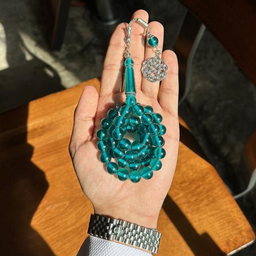 مسباح - بكلايت سماوي شفاف