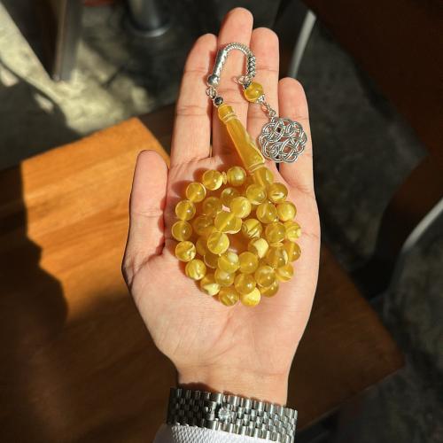 مسباح - بكلايت اصفر شفاف رخامي