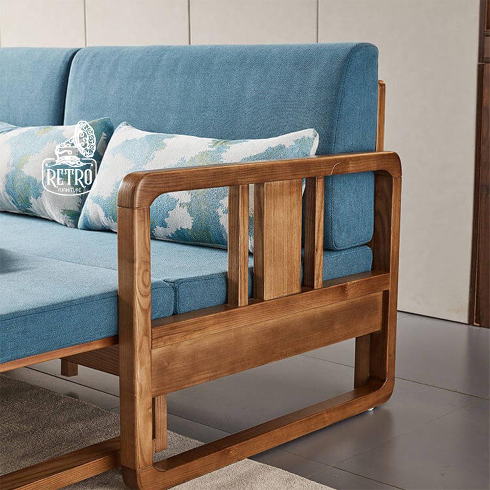 كنبة كبيرة مصنوعة من خشب زان وقماش قطيفة عالي