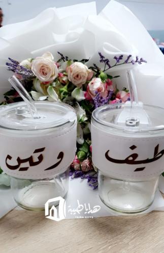 كوب زجاجي بمسكة جلد - شفاف