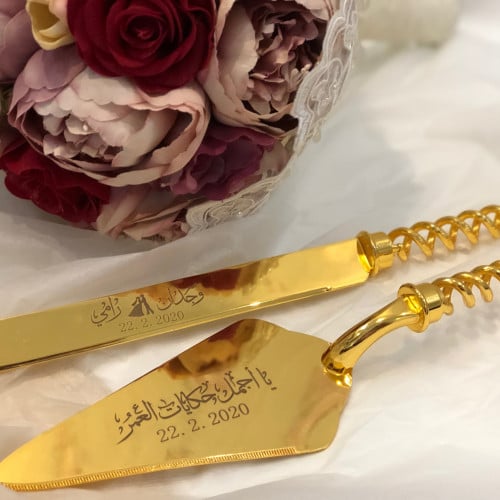 طقم كيك ذهبي مقبض دائري (سكين+قطاعة)