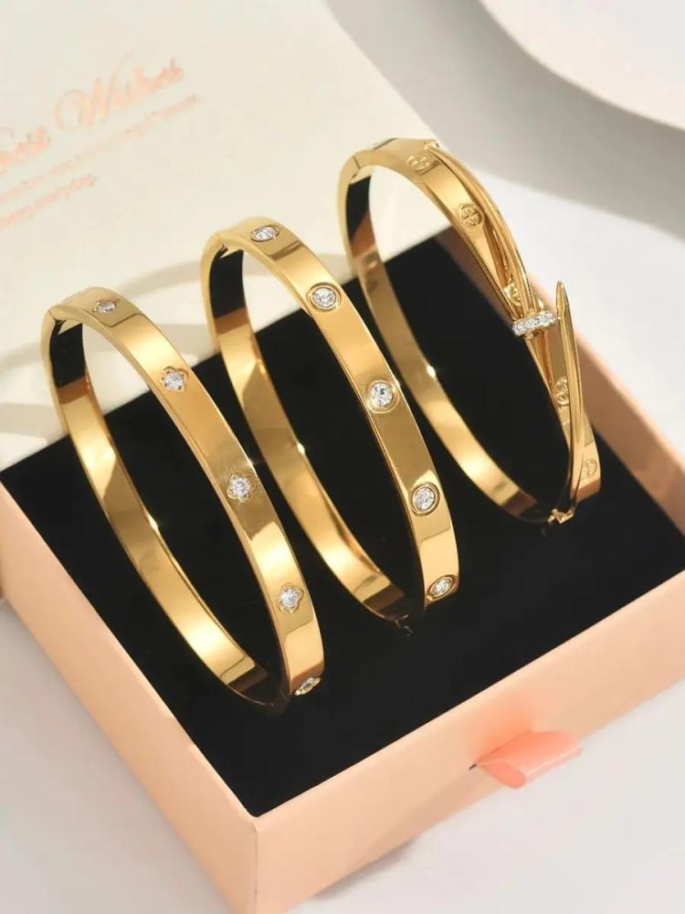 مجموعة من أساور الفولاذ المقاوم للصدأ المطلية بالذهب عيار 18