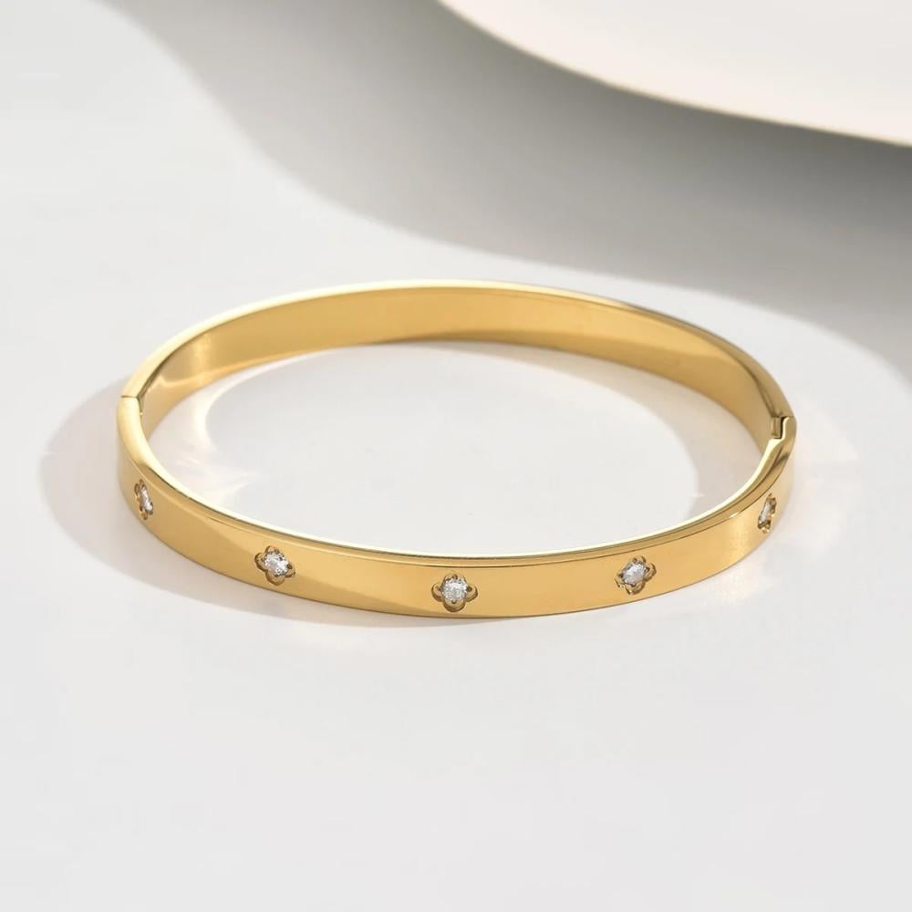 مجموعة من أساور الفولاذ المقاوم للصدأ المطلية بالذهب عيار 18