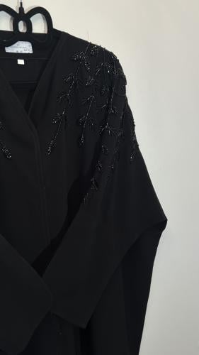 عين