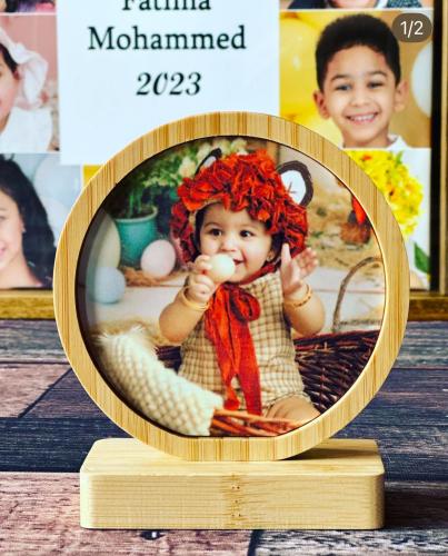 صورة سبليماشون مع اطار خشبي دائري
