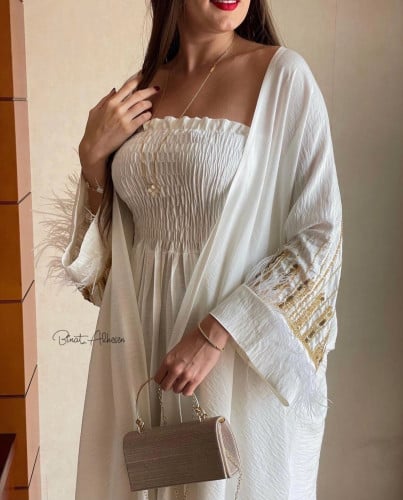 عباءة مطرزه يدوياً مع فستان RD33