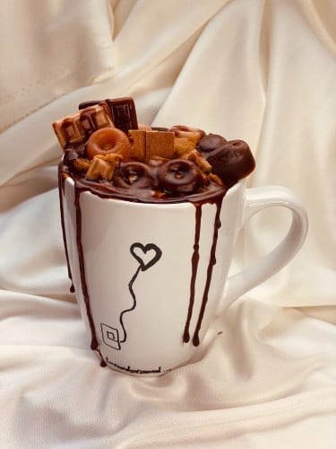 شمعة القهوه بالرغوة