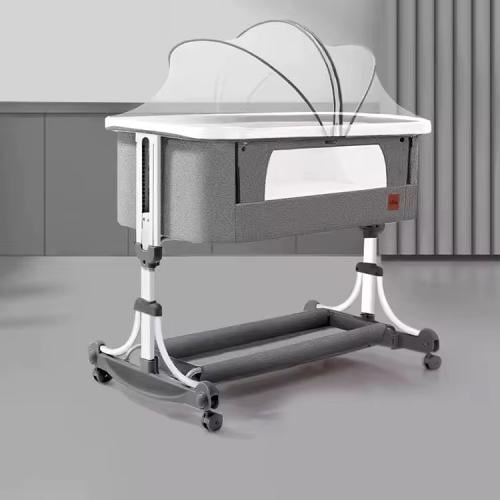 سرير مواليد بجوار الام