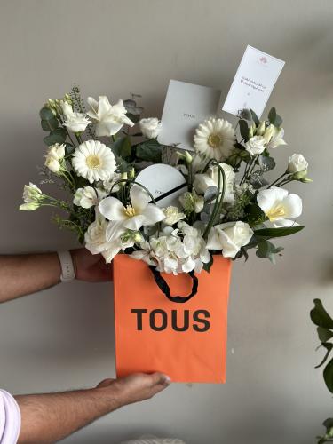 سوار فولاذي من TOUS مع ورد
