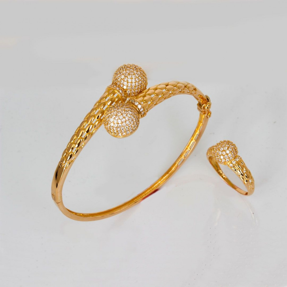 Bracelet with a 21-karat gold ring - أزوري للمجوهرات والألماس ...